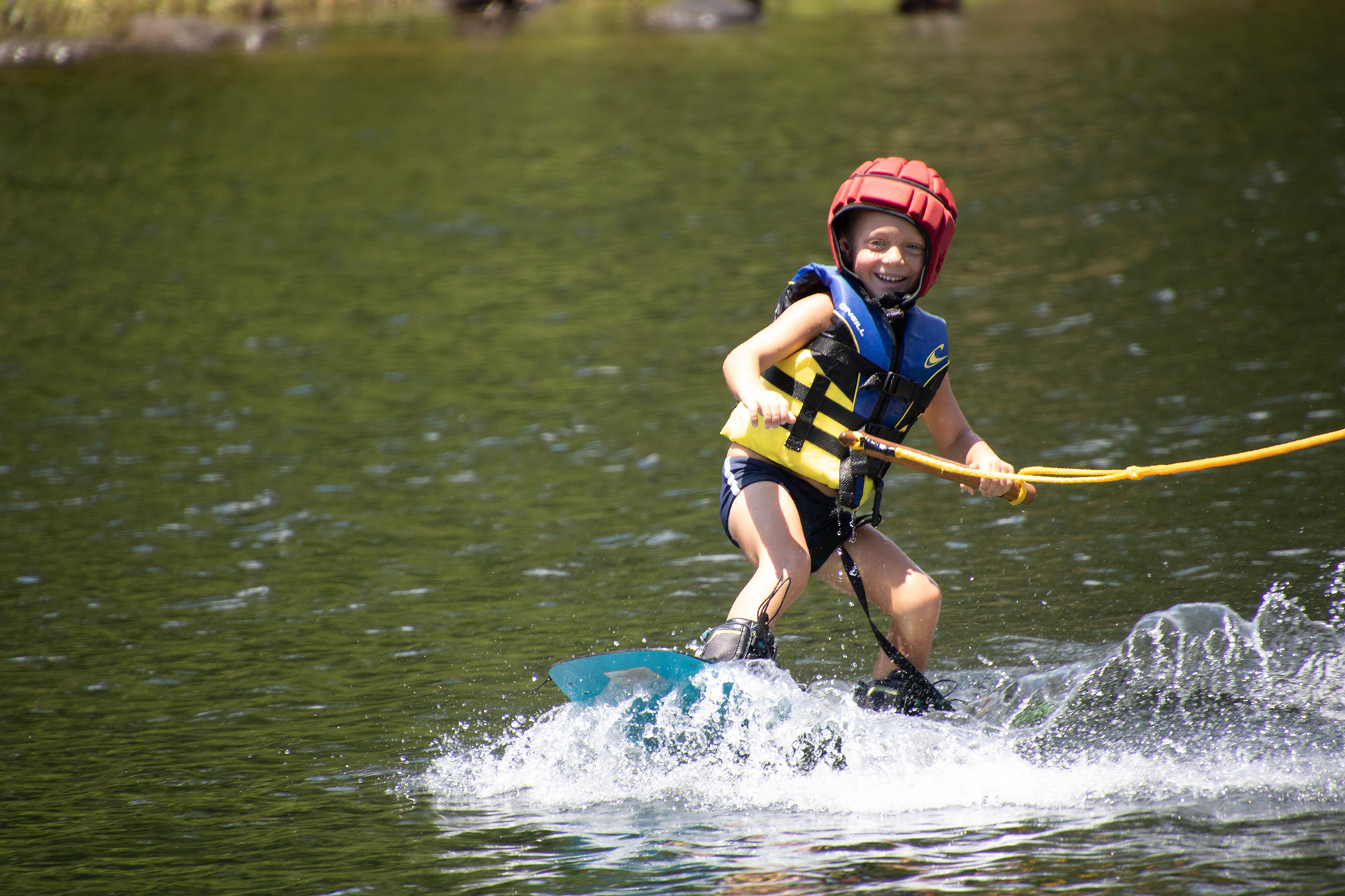 kid wakeboarding